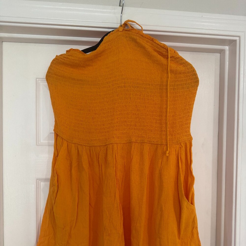 Two smocked rompers